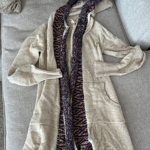 Woman’s small long sweater